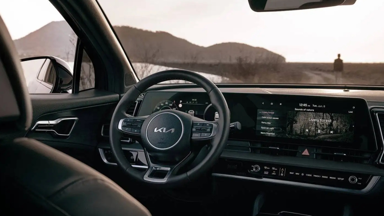 vue de l'habitacle et tableau de bord d'une Kia Sportage 2025